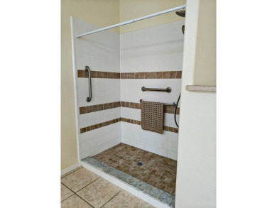 A RARE OPPORTUNITY TO FIND THIS MODEL AT THIS PRICE.  OWNERS ARE on Southport Springs Golf Club in Florida - for sale on GolfHomes.com, golf home, golf lot