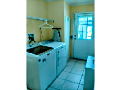 A RARE OPPORTUNITY TO FIND THIS MODEL AT THIS PRICE.  OWNERS ARE on Southport Springs Golf Club in Florida - for sale on GolfHomes.com, golf home, golf lot