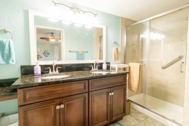 Nestled within the welcoming embrace of Whispering Pines in on Lily Lake Golf and RV Resort in Florida - for sale on GolfHomes.com, golf home, golf lot