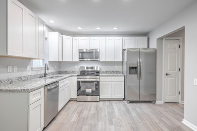 Discover this beautifully renovated home and nestled in one of on Golf Club At Wescott Plantation in South Carolina - for sale on GolfHomes.com, golf home, golf lot