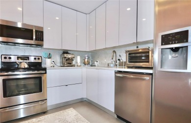 STUNNINGLY RENOVATED MODERN 2B/R 2B/A WITH DIRECT GOLF COURSE & on Turnberry Isle Resort and Club in Florida - for sale on GolfHomes.com, golf home, golf lot