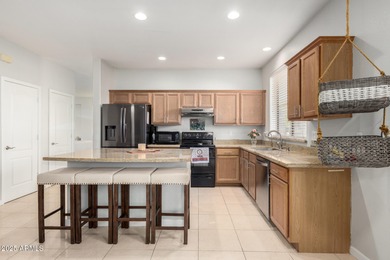 Seize the chance to own this delightful 4-bedroom residence in on Palm Valley Golf Club  in Arizona - for sale on GolfHomes.com, golf home, golf lot