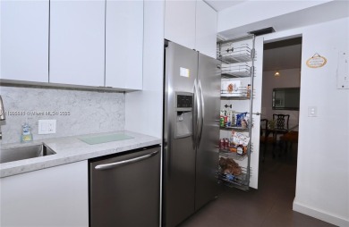 STUNNINGLY RENOVATED MODERN 2B/R 2B/A WITH DIRECT GOLF COURSE & on Turnberry Isle Resort and Club in Florida - for sale on GolfHomes.com, golf home, golf lot
