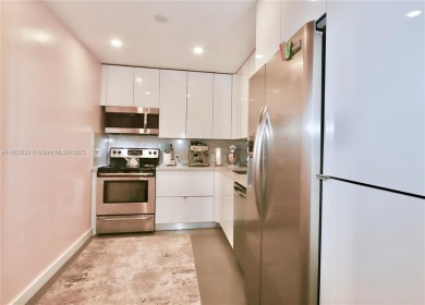 STUNNINGLY RENOVATED MODERN 2B/R 2B/A WITH DIRECT GOLF COURSE & on Turnberry Isle Resort and Club in Florida - for sale on GolfHomes.com, golf home, golf lot