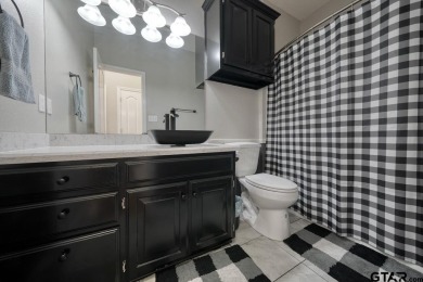 Welcome to your waterfront home! Discover the perfect blend of on Hide-A-Way Lake Golf Course in Texas - for sale on GolfHomes.com, golf home, golf lot