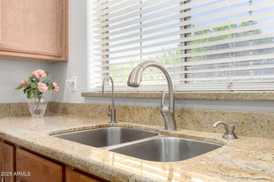 Seize the chance to own this delightful 4-bedroom residence in on Palm Valley Golf Club  in Arizona - for sale on GolfHomes.com, golf home, golf lot