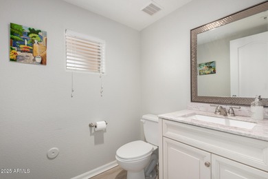 Seize the chance to own this delightful 4-bedroom residence in on Palm Valley Golf Club  in Arizona - for sale on GolfHomes.com, golf home, golf lot