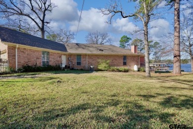 Welcome to your waterfront home! Discover the perfect blend of on Hide-A-Way Lake Golf Course in Texas - for sale on GolfHomes.com, golf home, golf lot