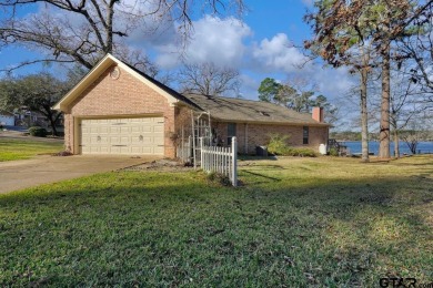 Welcome to your waterfront home! Discover the perfect blend of on Hide-A-Way Lake Golf Course in Texas - for sale on GolfHomes.com, golf home, golf lot