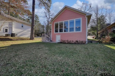 Welcome to your waterfront home! Discover the perfect blend of on Hide-A-Way Lake Golf Course in Texas - for sale on GolfHomes.com, golf home, golf lot