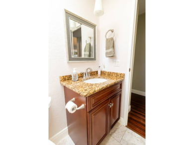 Nestled within the welcoming embrace of Whispering Pines in on Lily Lake Golf and RV Resort in Florida - for sale on GolfHomes.com, golf home, golf lot