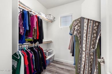 Seize the chance to own this delightful 4-bedroom residence in on Palm Valley Golf Club  in Arizona - for sale on GolfHomes.com, golf home, golf lot