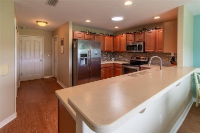 Experience the comfort, quality, and elegance of this on Summerglen Country Club in Florida - for sale on GolfHomes.com, golf home, golf lot