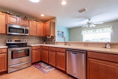 Experience the comfort, quality, and elegance of this on Summerglen Country Club in Florida - for sale on GolfHomes.com, golf home, golf lot