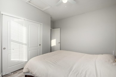 Seize the chance to own this delightful 4-bedroom residence in on Palm Valley Golf Club  in Arizona - for sale on GolfHomes.com, golf home, golf lot