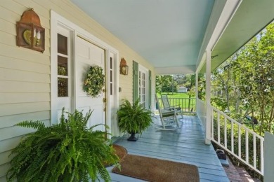Lovely raised Acadian cottage on an oversized lot fronting the on Covington Country Club in Louisiana - for sale on GolfHomes.com, golf home, golf lot