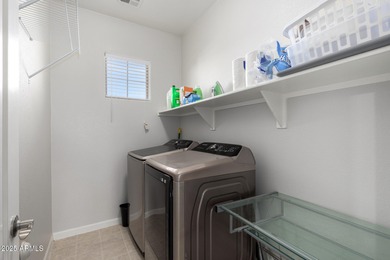 Seize the chance to own this delightful 4-bedroom residence in on Palm Valley Golf Club  in Arizona - for sale on GolfHomes.com, golf home, golf lot