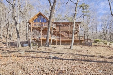 This beautiful, meticulously maintained log home sits on .95 on Bent Tree Golf Course in Georgia - for sale on GolfHomes.com, golf home, golf lot