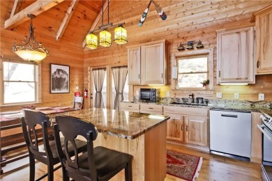 This beautiful, meticulously maintained log home sits on .95 on Bent Tree Golf Course in Georgia - for sale on GolfHomes.com, golf home, golf lot