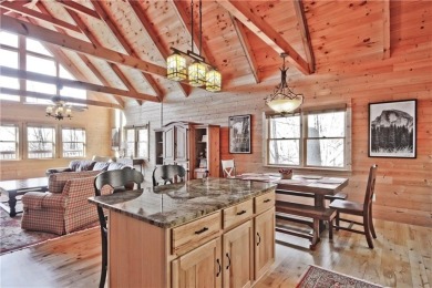 This beautiful, meticulously maintained log home sits on .95 on Bent Tree Golf Course in Georgia - for sale on GolfHomes.com, golf home, golf lot