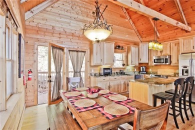 This beautiful, meticulously maintained log home sits on .95 on Bent Tree Golf Course in Georgia - for sale on GolfHomes.com, golf home, golf lot