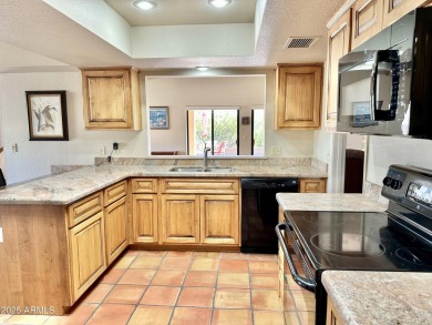 Nestled into a quiet street within the Rio Verde active adult on Rio Verde Country Club - Quail Run in Arizona - for sale on GolfHomes.com, golf home, golf lot