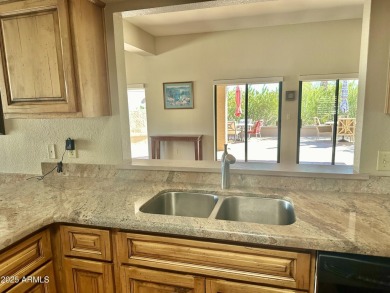 Nestled into a quiet street within the Rio Verde active adult on Rio Verde Country Club - Quail Run in Arizona - for sale on GolfHomes.com, golf home, golf lot