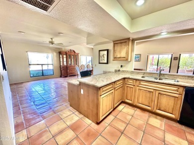 Nestled into a quiet street within the Rio Verde active adult on Rio Verde Country Club - Quail Run in Arizona - for sale on GolfHomes.com, golf home, golf lot