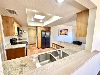 Nestled into a quiet street within the Rio Verde active adult on Rio Verde Country Club - Quail Run in Arizona - for sale on GolfHomes.com, golf home, golf lot
