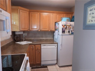 Welcome home to this updated 2 bedroom, 1 bathroom condo on Monterey Yacht and Country Club in Florida - for sale on GolfHomes.com, golf home, golf lot