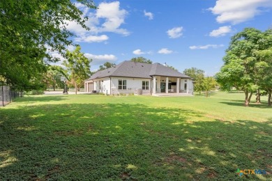 Captivating 4 bedroom home with 3 baths on 1.5 acres. The on Mill Creek Golf Club in Texas - for sale on GolfHomes.com, golf home, golf lot