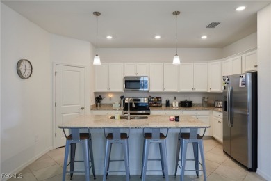 What a stunning newer construction home available here in on River Hall Country Club in Florida - for sale on GolfHomes.com, golf home, golf lot