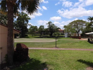 Welcome home to this updated 2 bedroom, 1 bathroom condo on Monterey Yacht and Country Club in Florida - for sale on GolfHomes.com, golf home, golf lot
