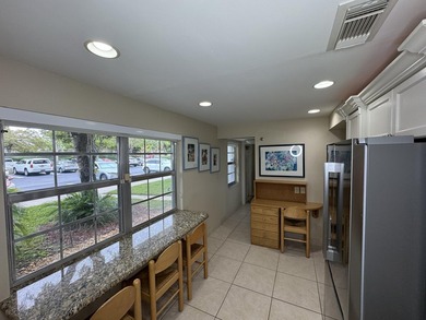 Move-in ready and beautifully maintained 3BR/2.5BA condo in on Palm-Aire Country Club and Resort - The Oaks in Florida - for sale on GolfHomes.com, golf home, golf lot