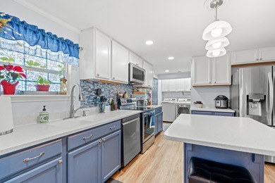 Nestled in the heart of Windjammer Village, 34 Spinnaker Lane is on Indian Wells Golf Course in South Carolina - for sale on GolfHomes.com, golf home, golf lot