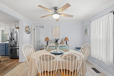 Nestled in the heart of Windjammer Village, 34 Spinnaker Lane is on Indian Wells Golf Course in South Carolina - for sale on GolfHomes.com, golf home, golf lot