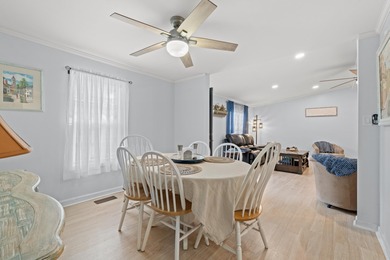 Nestled in the heart of Windjammer Village, 34 Spinnaker Lane is on Indian Wells Golf Course in South Carolina - for sale on GolfHomes.com, golf home, golf lot