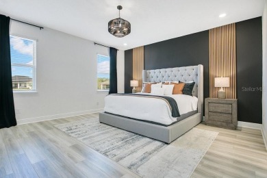 This exquisite waterfront residence, located within the LPGA on LPGA International Golf Course in Florida - for sale on GolfHomes.com, golf home, golf lot