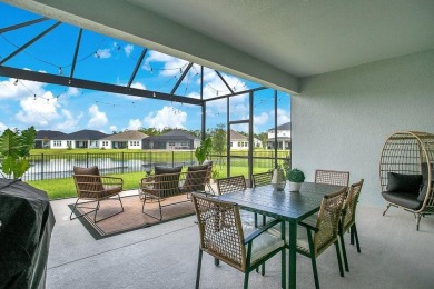 This exquisite waterfront residence, located within the LPGA on LPGA International Golf Course in Florida - for sale on GolfHomes.com, golf home, golf lot