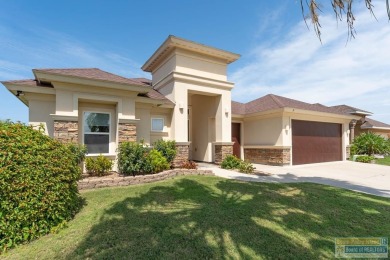 Welcome to coastal living at its finest! Custom built in 2017 on South Padre Island Golf Club in Texas - for sale on GolfHomes.com, golf home, golf lot