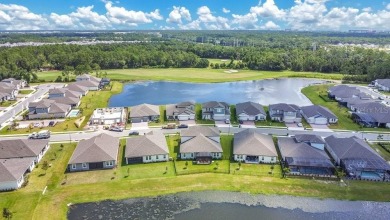 This exquisite waterfront residence, located within the LPGA on LPGA International Golf Course in Florida - for sale on GolfHomes.com, golf home, golf lot