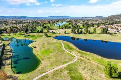 Welcome to 29827 Camino Cristal, a beautifully upgraded on Menifee Lakes Country Club - Lakes in California - for sale on GolfHomes.com, golf home, golf lot