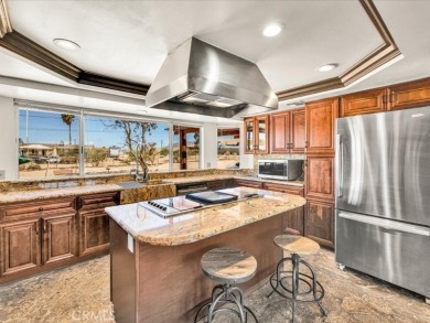 Welcome to this beautifully updated 2,055 sq ft home, ideally on Roadrunner Dunes Golf Course in California - for sale on GolfHomes.com, golf home, golf lot