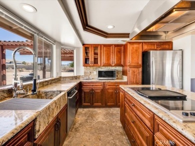 Welcome to this beautifully updated 2,055 sq ft home, ideally on Roadrunner Dunes Golf Course in California - for sale on GolfHomes.com, golf home, golf lot