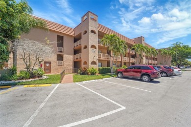 Updated custom kitchen, bathroom and floors, beautiful view of on Sunrise Lakes Phase III in Florida - for sale on GolfHomes.com, golf home, golf lot