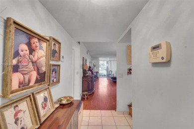 Updated custom kitchen, bathroom and floors, beautiful view of on Sunrise Lakes Phase III in Florida - for sale on GolfHomes.com, golf home, golf lot