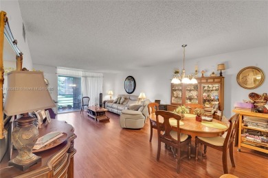 Updated custom kitchen, bathroom and floors, beautiful view of on Sunrise Lakes Phase III in Florida - for sale on GolfHomes.com, golf home, golf lot