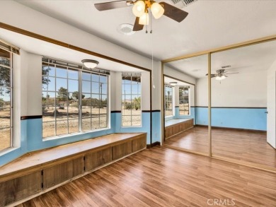 Welcome to this beautifully updated 2,055 sq ft home, ideally on Roadrunner Dunes Golf Course in California - for sale on GolfHomes.com, golf home, golf lot