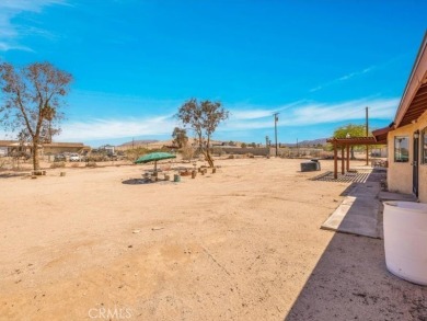 Welcome to this beautifully updated 2,055 sq ft home, ideally on Roadrunner Dunes Golf Course in California - for sale on GolfHomes.com, golf home, golf lot