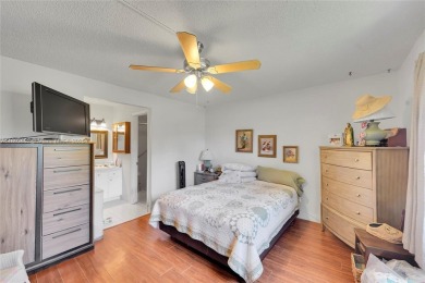 Updated custom kitchen, bathroom and floors, beautiful view of on Sunrise Lakes Phase III in Florida - for sale on GolfHomes.com, golf home, golf lot